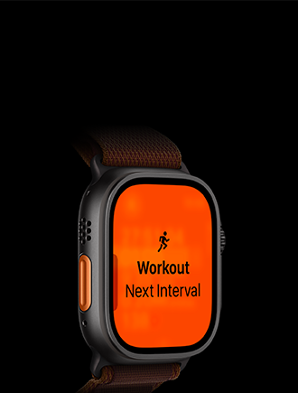 Apple Watch Ultra 4, Titangehäuse, Farbe Schwarz, Lauftraining, nächstes Intervall, linke Seitenansicht, Actiontaste in Orange, Alpine Loop Armband